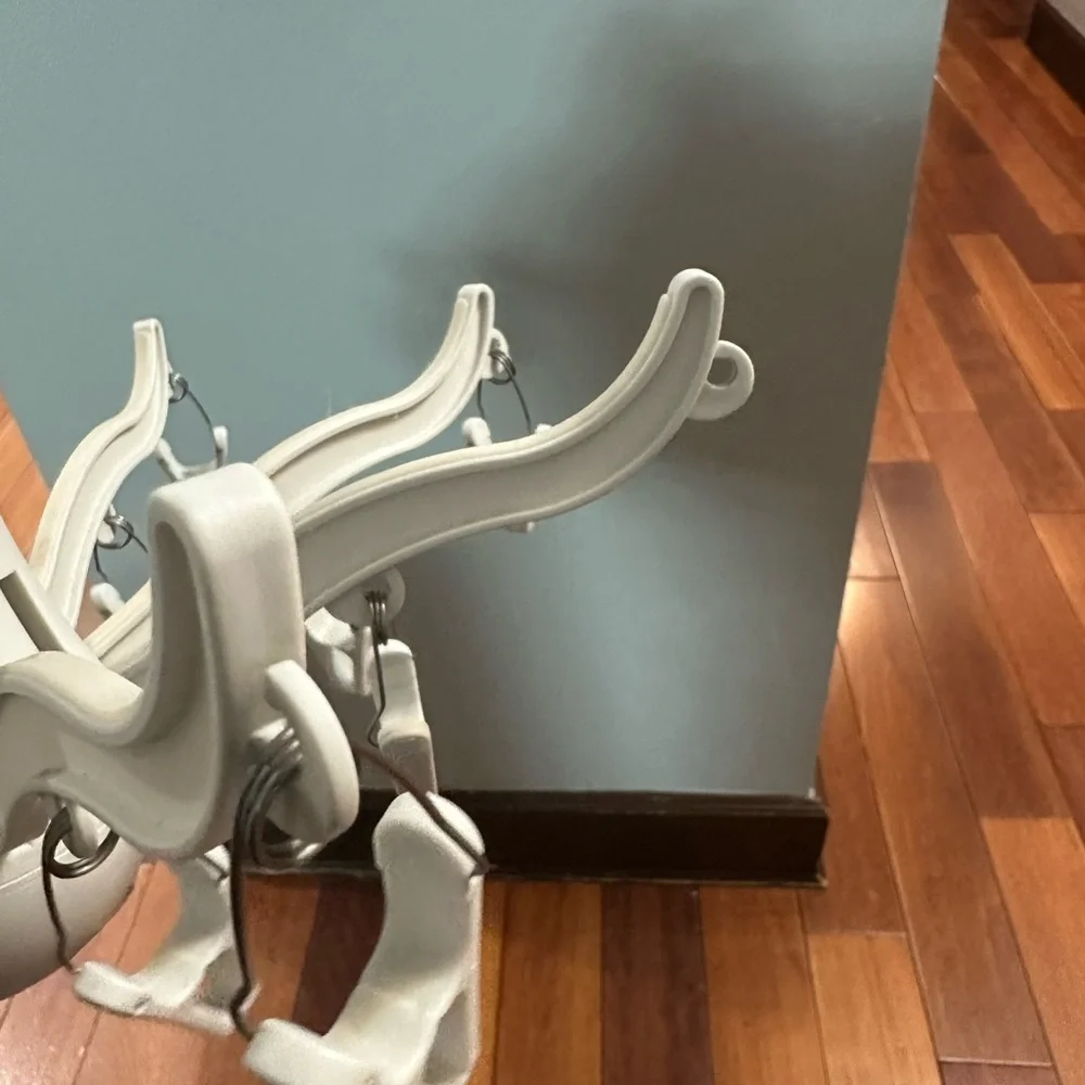 Foldable clip and drip hanger new never used